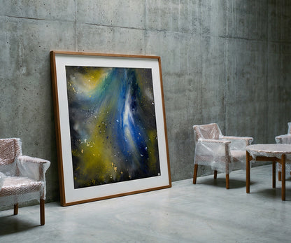 Abstract blue and yellow artwork in wooden frame styled against concrete wall in modern interior setting