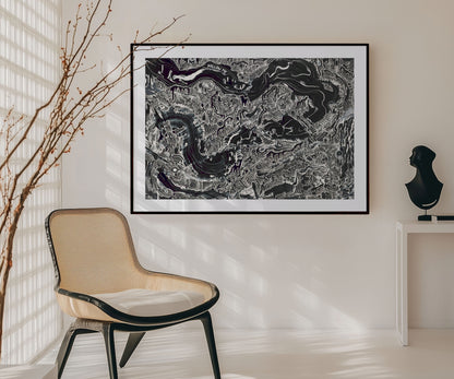 Large black and white abstract wall art print displayed in a modern interior.