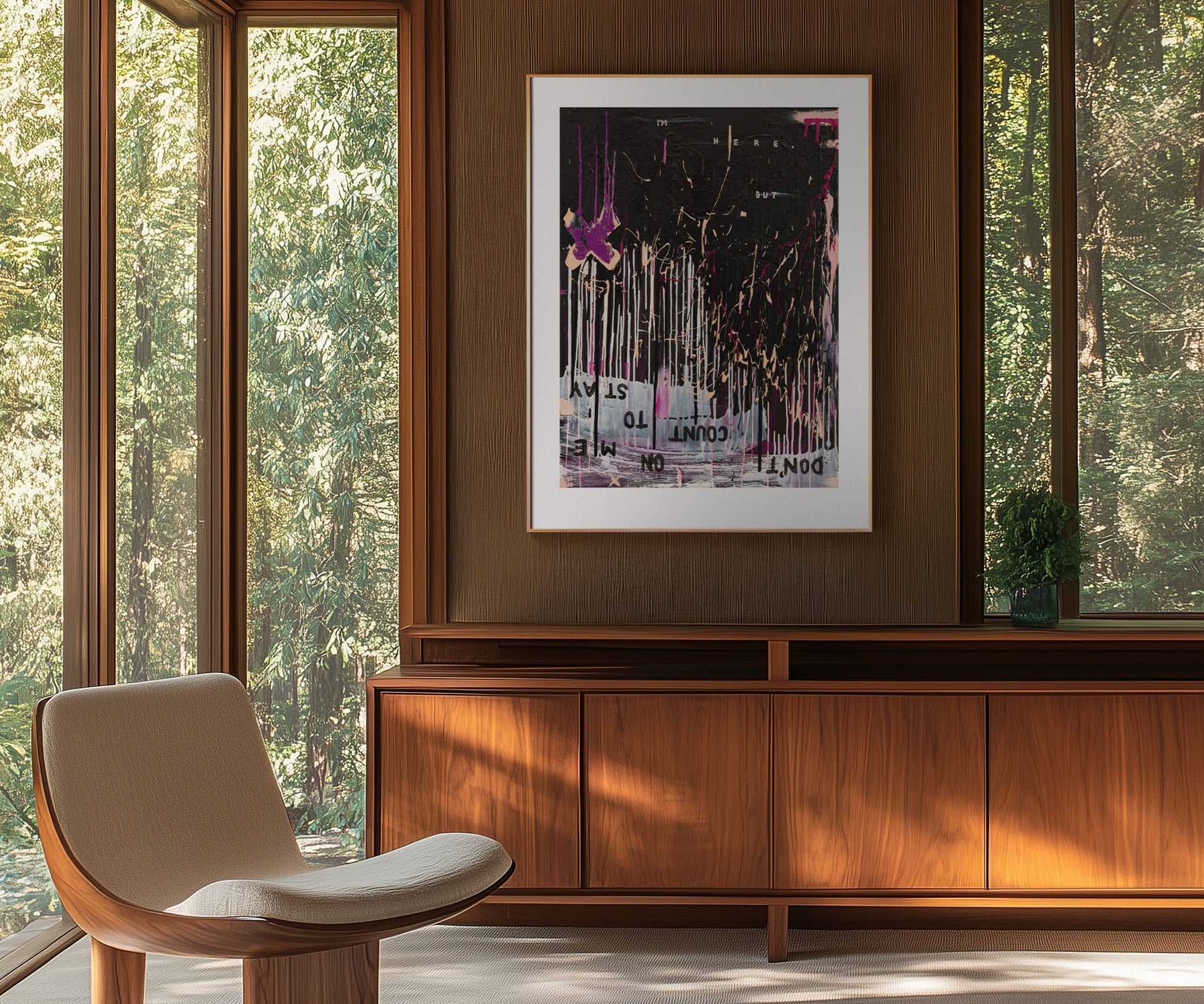 Framed abstract wall art print by The Jana Saga styled above a wooden cabinet in a modern interior.